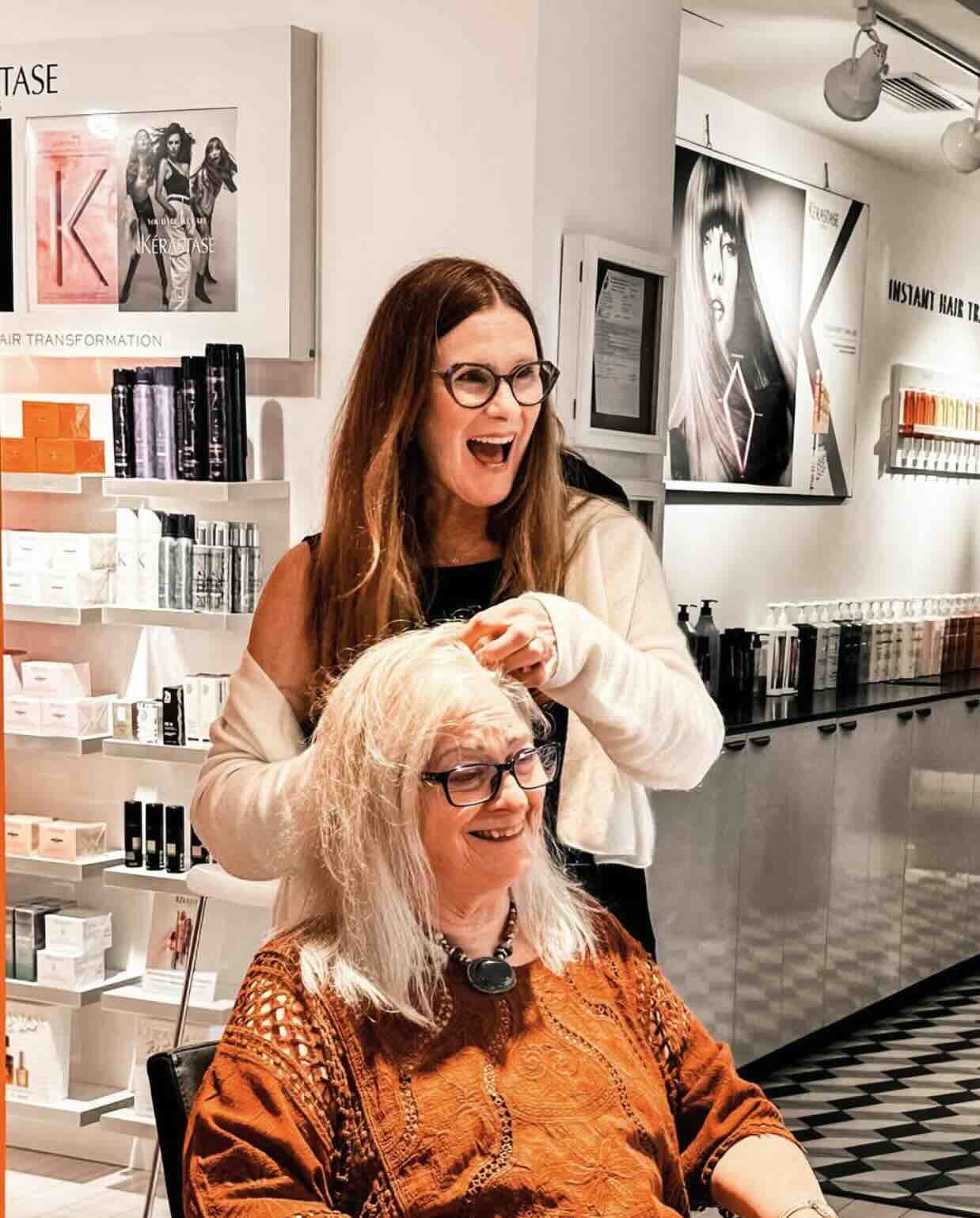 Expert stylist providing professional hair color and styling service at Jessica Todd Hair Salon
